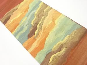 明綴れ波模様織出し袋帯